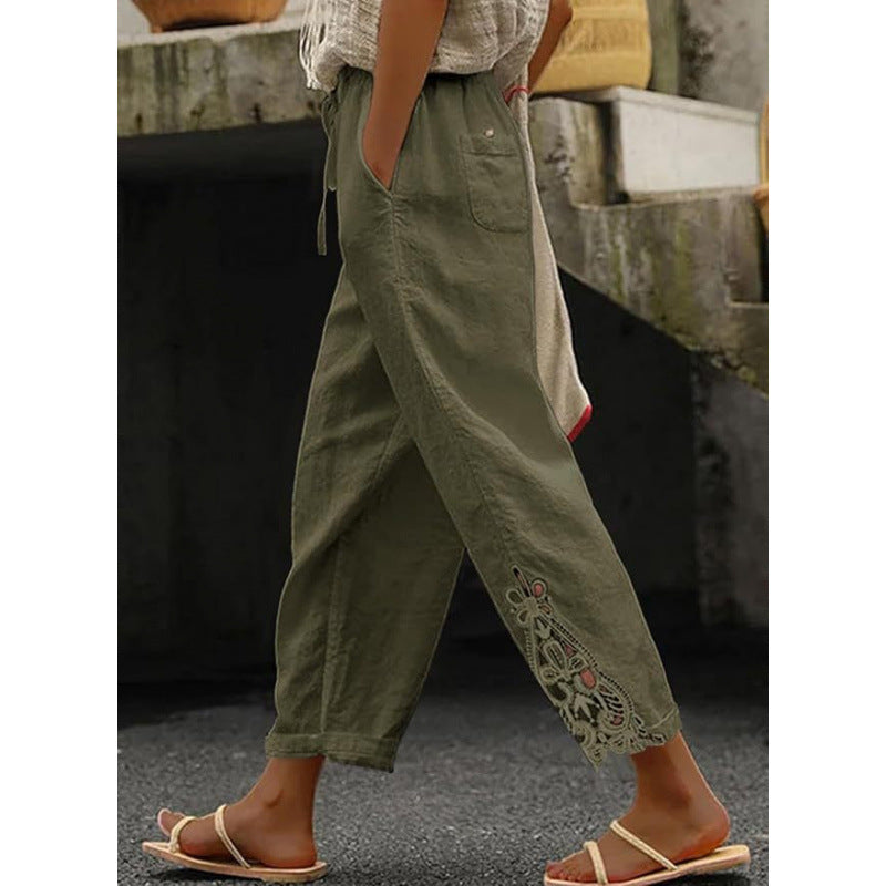Stylish lace-trimmed high-waisted cropped trousers